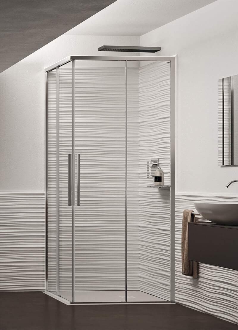 Cabina doccia ad angolo con doppia porta scorrevole. Collezione Puro