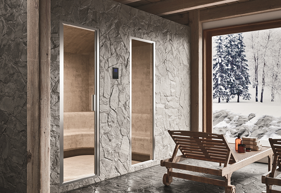 area benessere con box doccia con funzione di bagno turco in nicchia