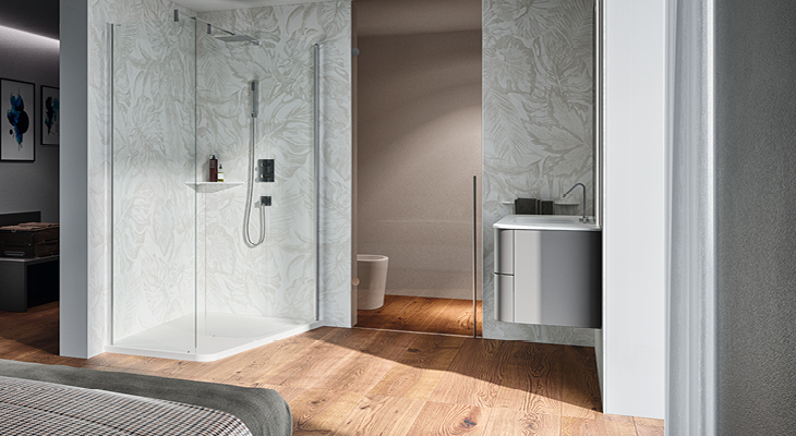 Semicircular walk-in shower enclosure in the bedroom