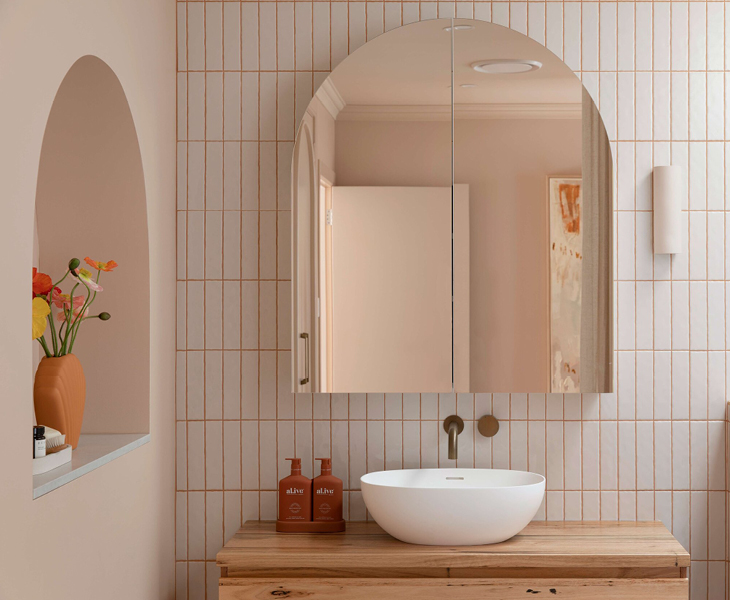 Rounded arched bathroom mirror