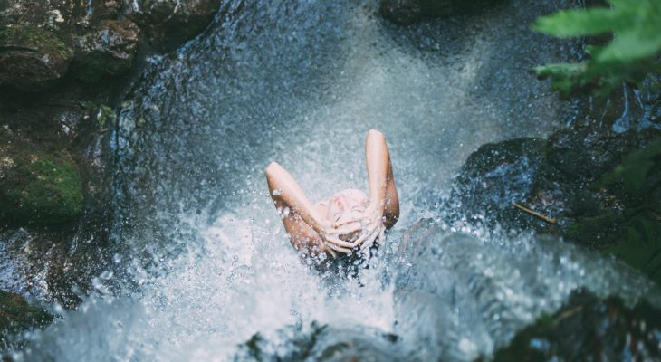 Shower under a waterfall photo from above